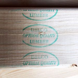 Delco Lumber Quality Stamp