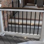 Trex Railing Select in White with Aluminum Round Black balusters and Trex Spiced Rum 2×4 top rail